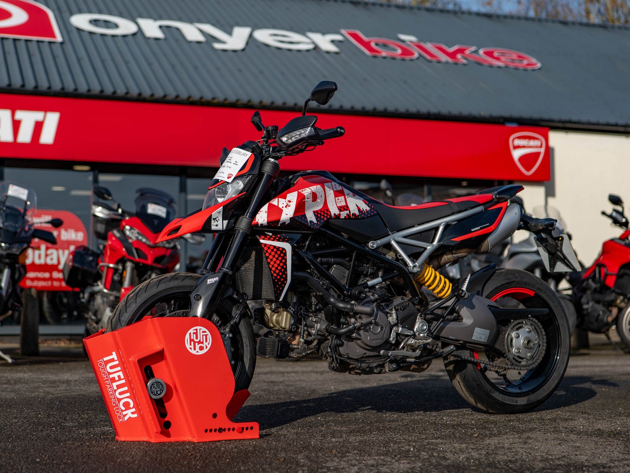 TufLuck - Tough Motorcycle Parking Lock - Ground Anchor & Wheel Chock